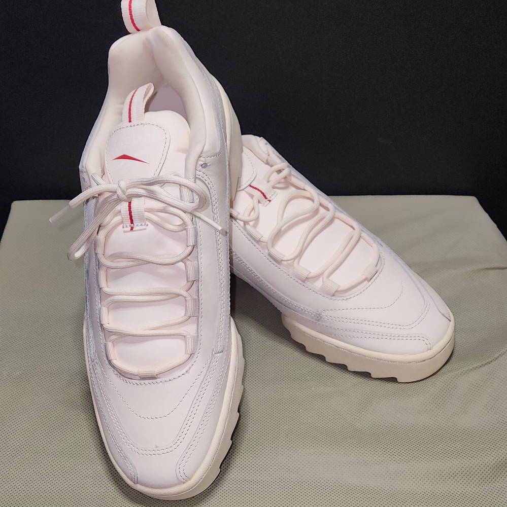 Reebok Pink Sneakers with Subtle Red Highlights